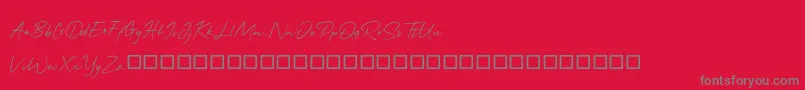 QonitaSignature-Schriftart – Graue Schriften auf rotem Hintergrund