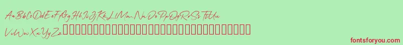 QonitaSignature-Schriftart – Rote Schriften auf grünem Hintergrund