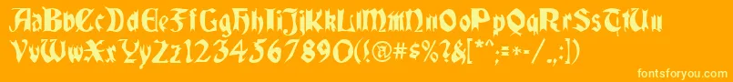 QuaelGothic-Schriftart – Gelbe Schriften auf orangefarbenem Hintergrund