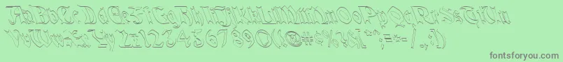 QuaelGothicHollowLefty Font – Gray Fonts on Green Background