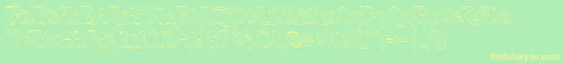 QuaelGothicHollowLefty-Schriftart – Gelbe Schriften auf grünem Hintergrund