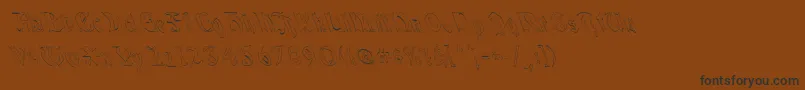QuaelGothicHollowLeftyCondensed Font – Black Fonts on Brown Background
