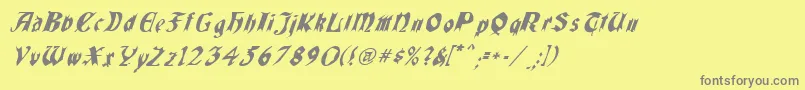 QuaelGothicItalicsCondensed Font – Gray Fonts on Yellow Background