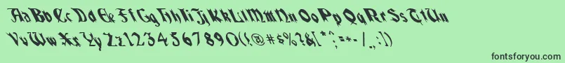 QuaelGothicLeftyCondensed Font – Black Fonts on Green Background