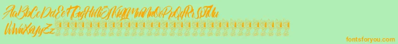 Quaint-Schriftart – Orangefarbene Schriften auf grünem Hintergrund