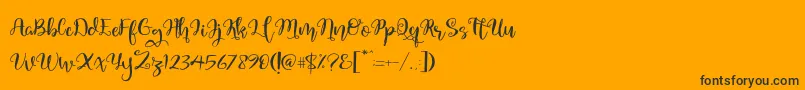 Quaked Font – Black Fonts on Orange Background