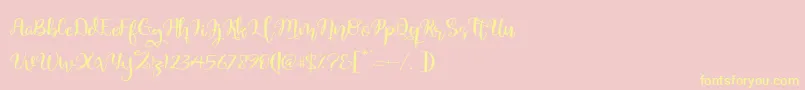 Quaked Font – Yellow Fonts on Pink Background