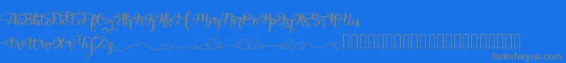 QuakedSwash-Schriftart – Graue Schriften auf blauem Hintergrund