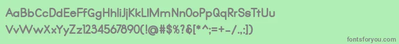 フォントQualio black – 緑の背景に灰色の文字