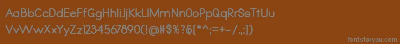 フォントQualio bold – 茶色の背景に灰色の文字