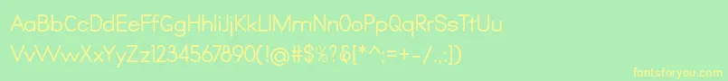 フォントQualio – 黄色の文字が緑の背景にあります