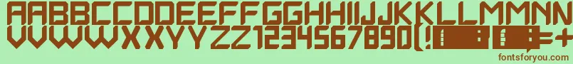Quantrum-fontti – ruskeat fontit vihreällä taustalla
