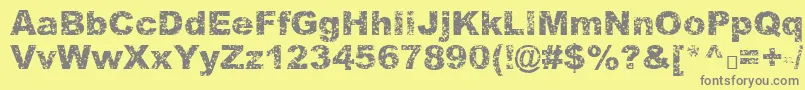 フォントQuasart – 黄色の背景に灰色の文字