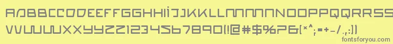 quasitronb-fontti – harmaat kirjasimet keltaisella taustalla