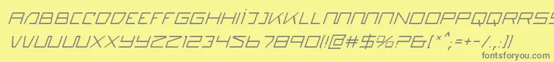 quasitroni-fontti – harmaat kirjasimet keltaisella taustalla