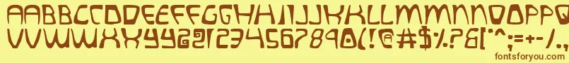 quatl Font – Brown Fonts on Yellow Background