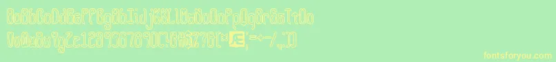 queasyol Font – Yellow Fonts on Green Background