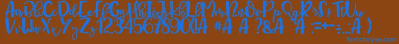 Queen Mataram Font – Blue Fonts on Brown Background