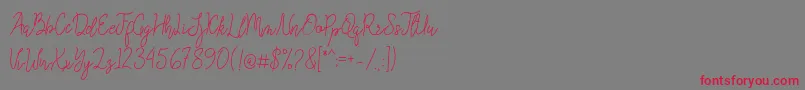 フォントQueenesia – 赤い文字の灰色の背景
