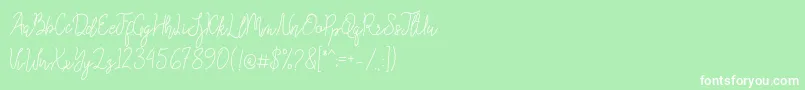 Шрифт Queenesia – белые шрифты на зелёном фоне