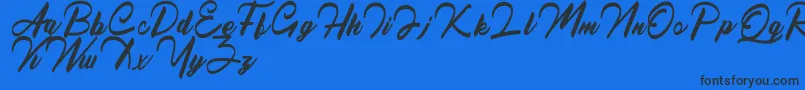 フォントQueenslandFree – 黒い文字の青い背景