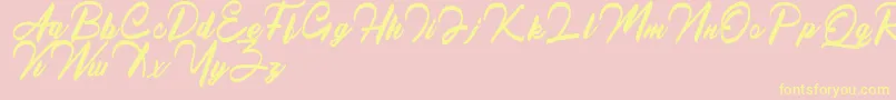 QueenslandFree-Schriftart – Gelbe Schriften auf rosa Hintergrund