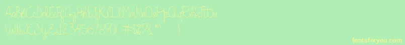 フォントQuesky – 黄色の文字が緑の背景にあります