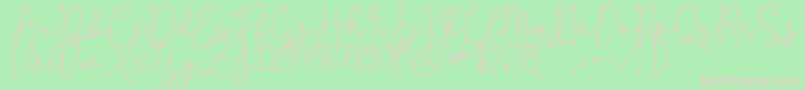 フォントQuestaWhitte – 緑の背景にピンクのフォント