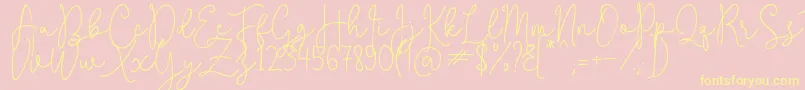 QuestaWhitte-Schriftart – Gelbe Schriften auf rosa Hintergrund