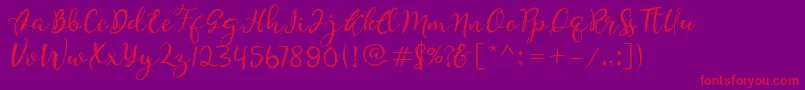 Quiche-Schriftart – Rote Schriften auf violettem Hintergrund