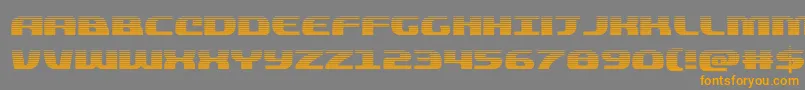 フォントquickeninggrad – オレンジの文字は灰色の背景にあります。