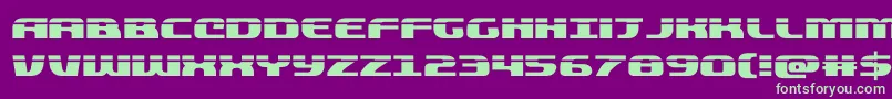 quickeninglaser Font – Green Fonts on Purple Background