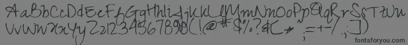 Zeyada Font – Black Fonts on Gray Background