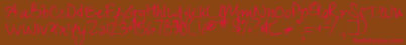 Zeyada-Schriftart – Rote Schriften auf braunem Hintergrund