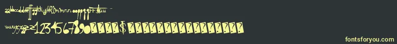 Holyscriptacular Font – Yellow Fonts on Black Background