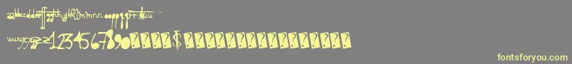 Holyscriptacular Font – Yellow Fonts on Gray Background
