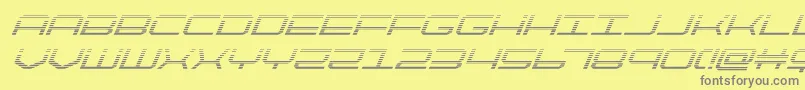 フォントquicktechgradital – 黄色の背景に灰色の文字