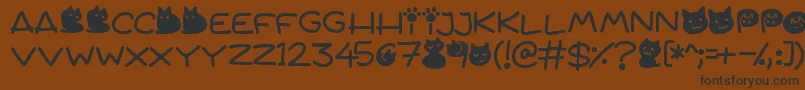 Quiet Meows Font – Black Fonts on Brown Background
