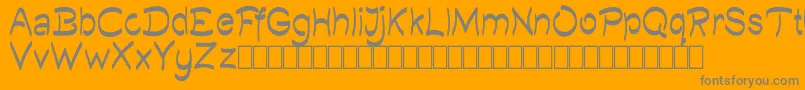 Więcej informacji o czcionce Quilty Demo Czcionka Quilty Demo – szare czcionki na pomarańczowym tle