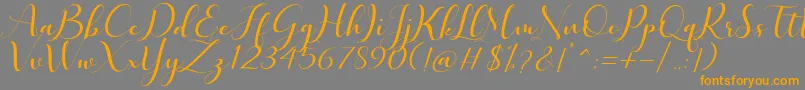 Quintella-Schriftart – Orangefarbene Schriften auf grauem Hintergrund