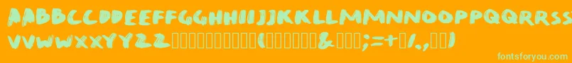 QuirkBrushBig-Schriftart – Grüne Schriften auf orangefarbenem Hintergrund