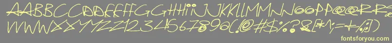 Шрифт Quirky Cat Italic – жёлтые шрифты на сером фоне