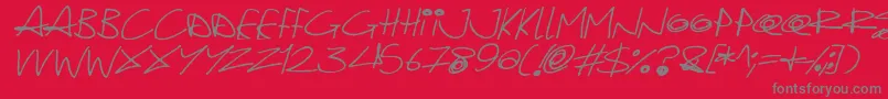 Police Quirky Cat Italic – polices grises sur fond rouge