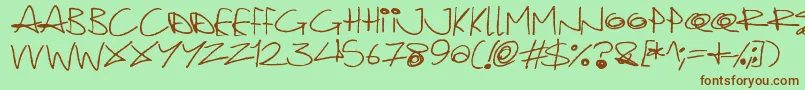 Quirky Cat Font – Brown Fonts on Green Background