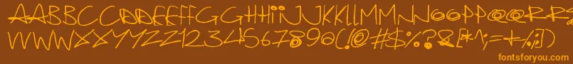 Quirky Cat Font – Orange Fonts on Brown Background