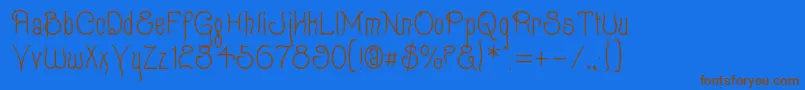 QUIXOT  -Schriftart – Braune Schriften auf blauem Hintergrund