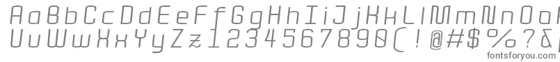 フォントQuota RegularItalicExt  – 白い背景に灰色の文字