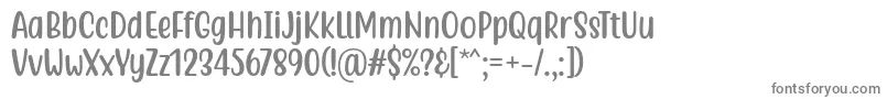 Quotable Regular Font by 7NTypes-fontti – harmaat kirjasimet valkoisella taustalla