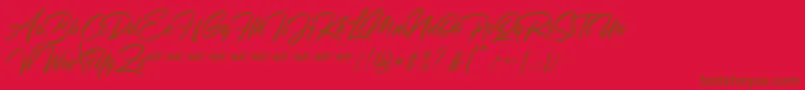 Qyara Demo Font – Brown Fonts on Red Background