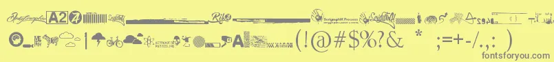 R74 Dingbat attak Font – Gray Fonts on Yellow Background